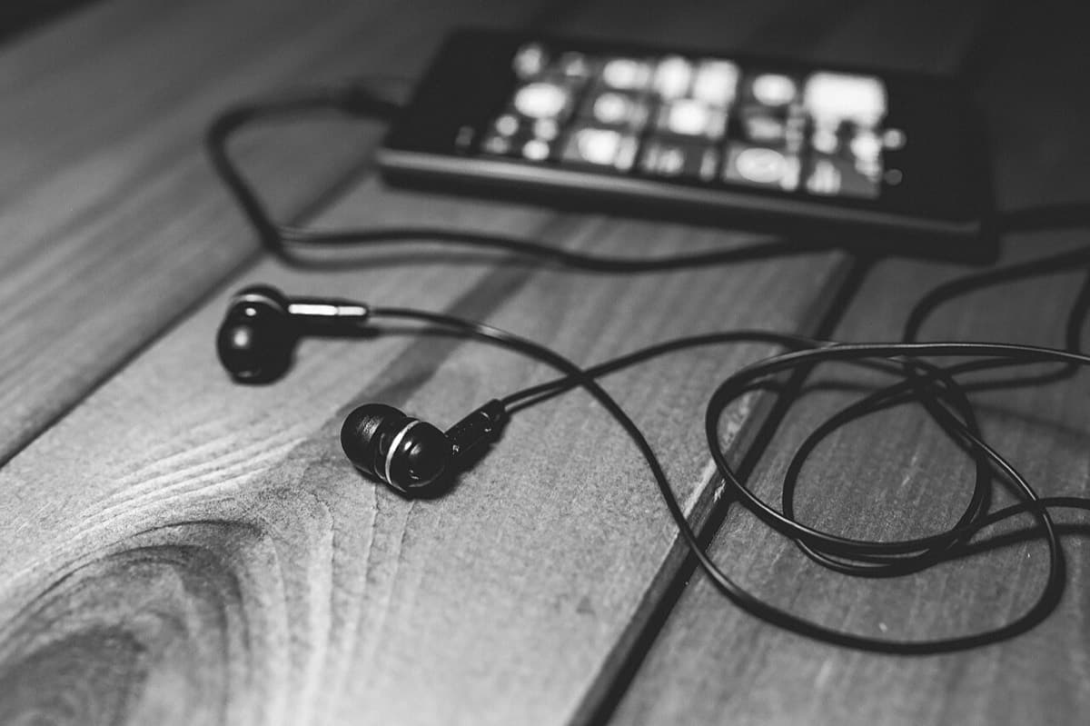 Earphones on a wooden desk